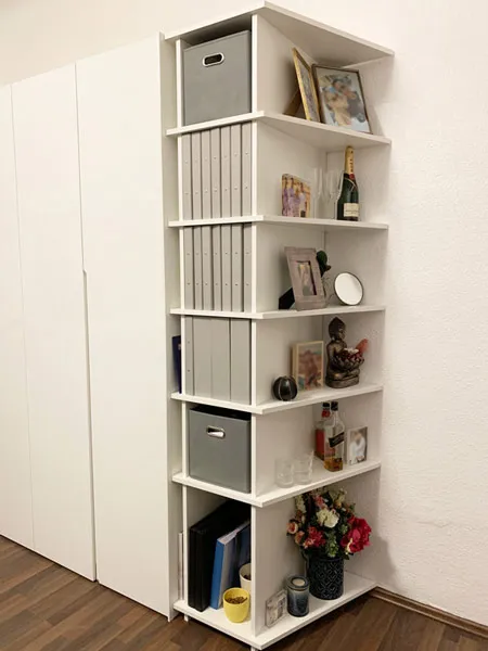 White corner shelf as a wardrobe extension