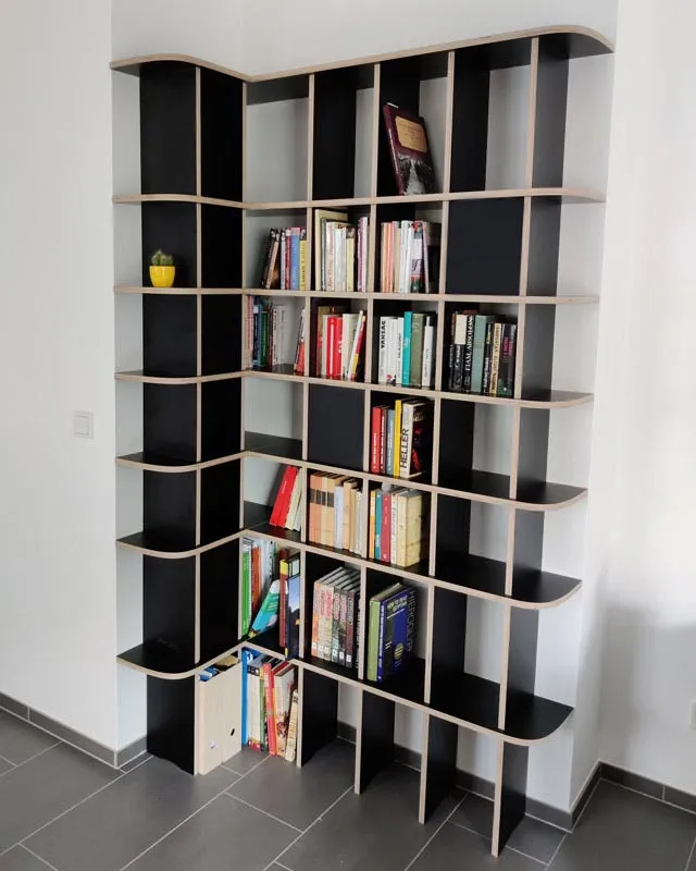 Corner shelf in hallway in black