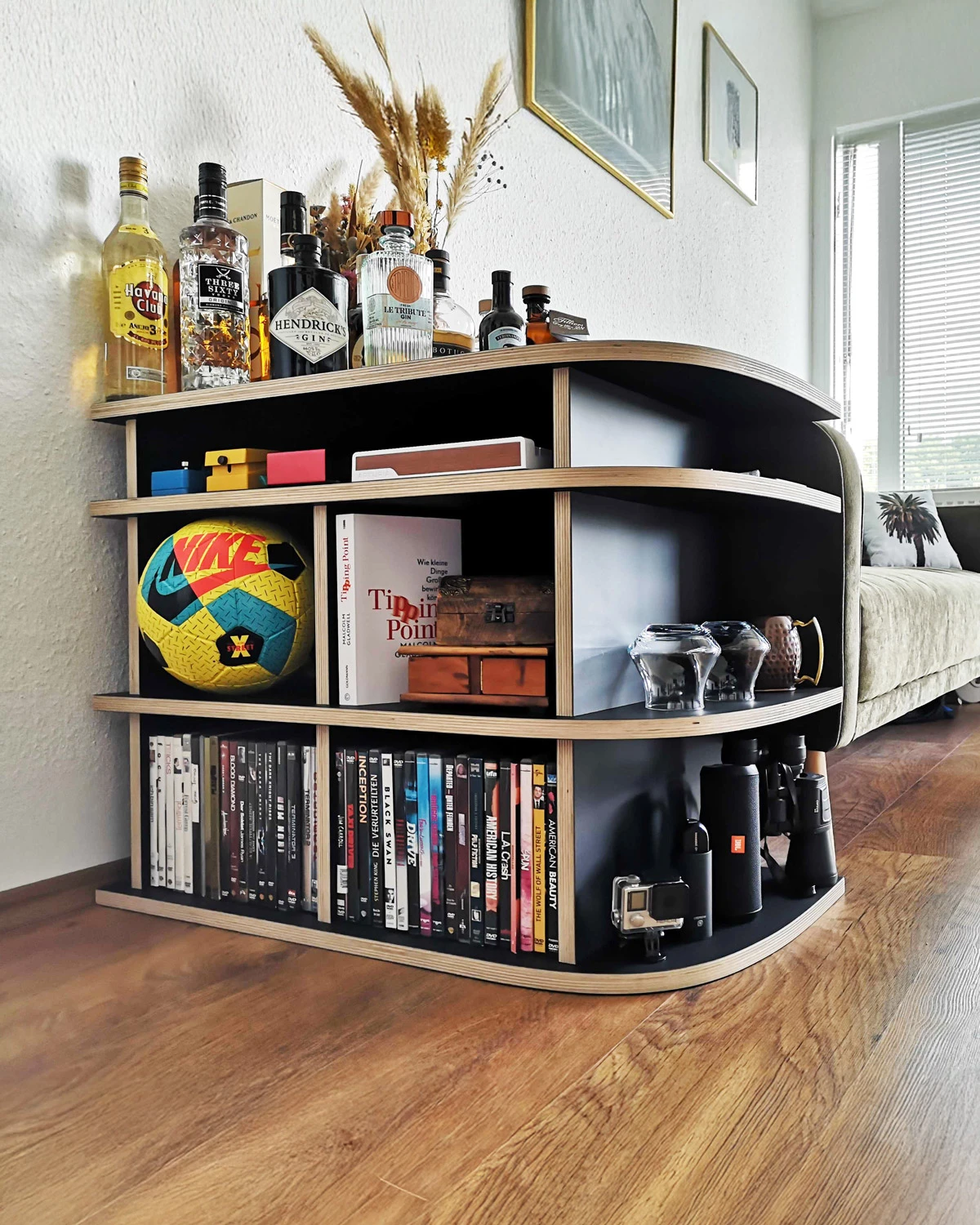 Black sideboard with rounded corners